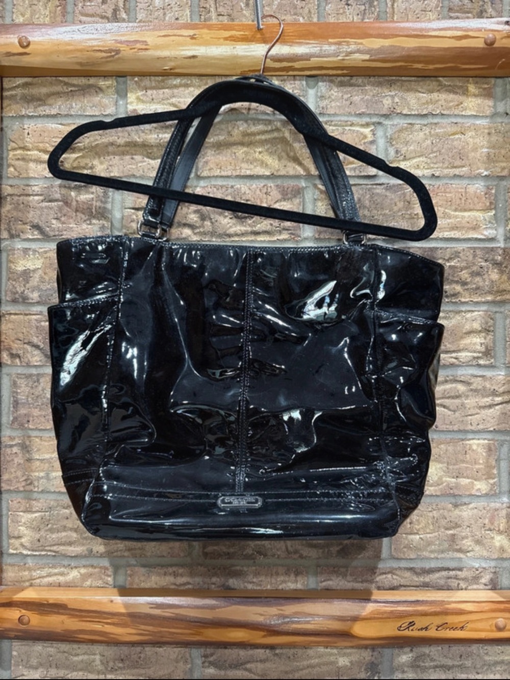 Coach women’s shoulder bag with Teal Interior